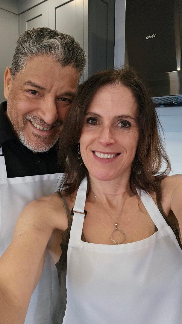 Tara and her husband Tom smiling